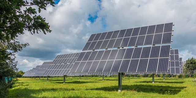 solar array under cloudy sky